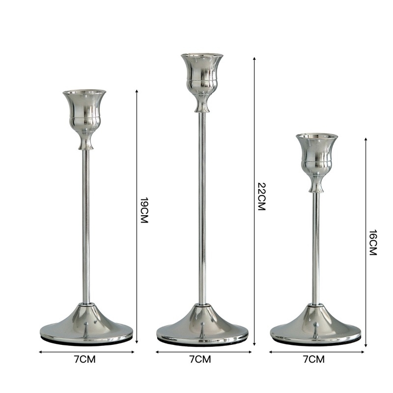 Gold, silver, and black candlestick three-piece set
