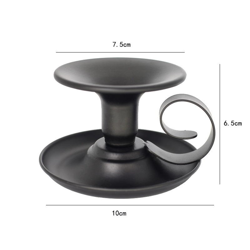 Gold and black candle holder with handle