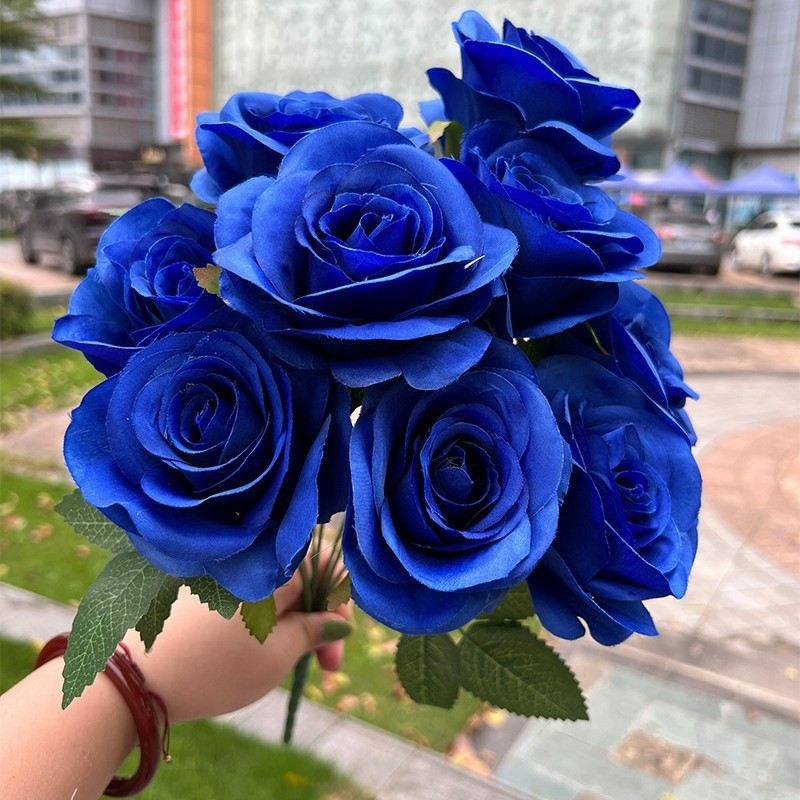 Artificial roses in various colors with nine blooms