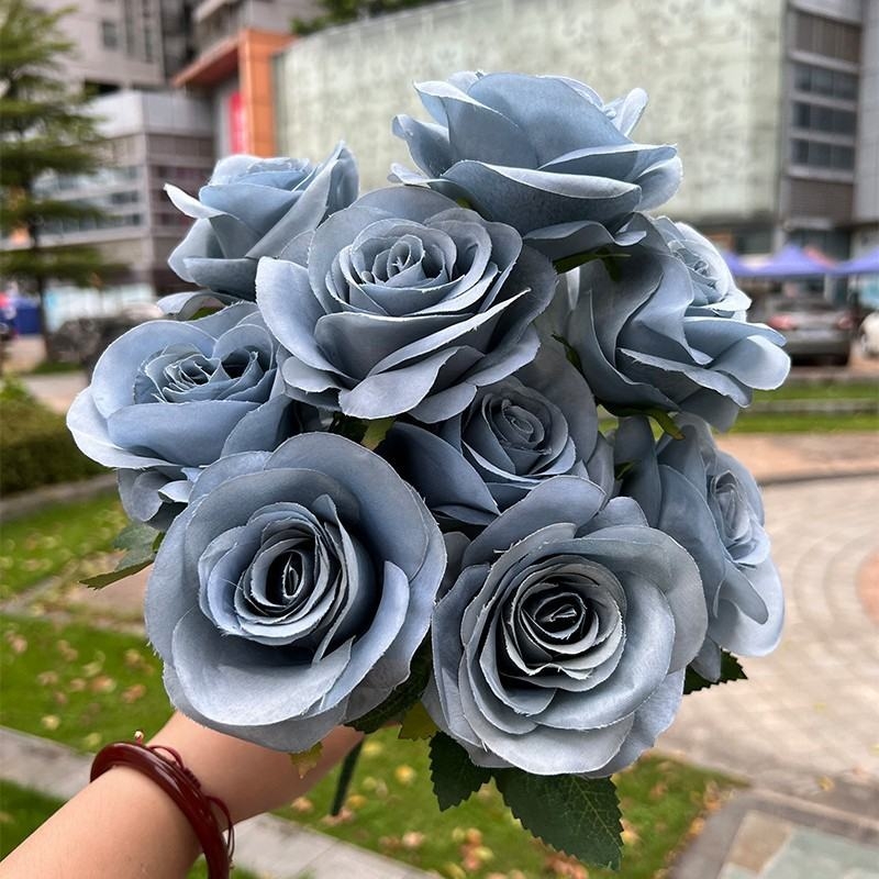 Artificial roses in various colors with nine blooms
