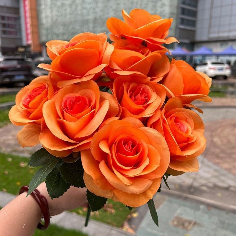 Artificial roses in various colors with nine blooms