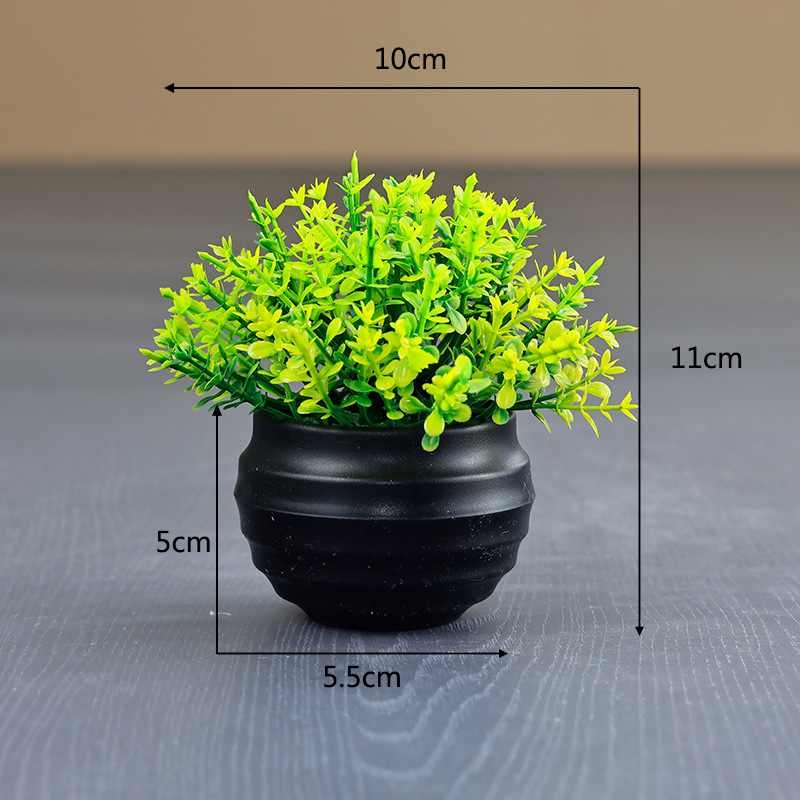 Artificial Eucalyptus plant in a black flower pot