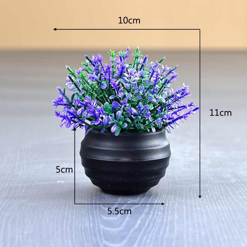 Artificial Eucalyptus plant in a black flower pot