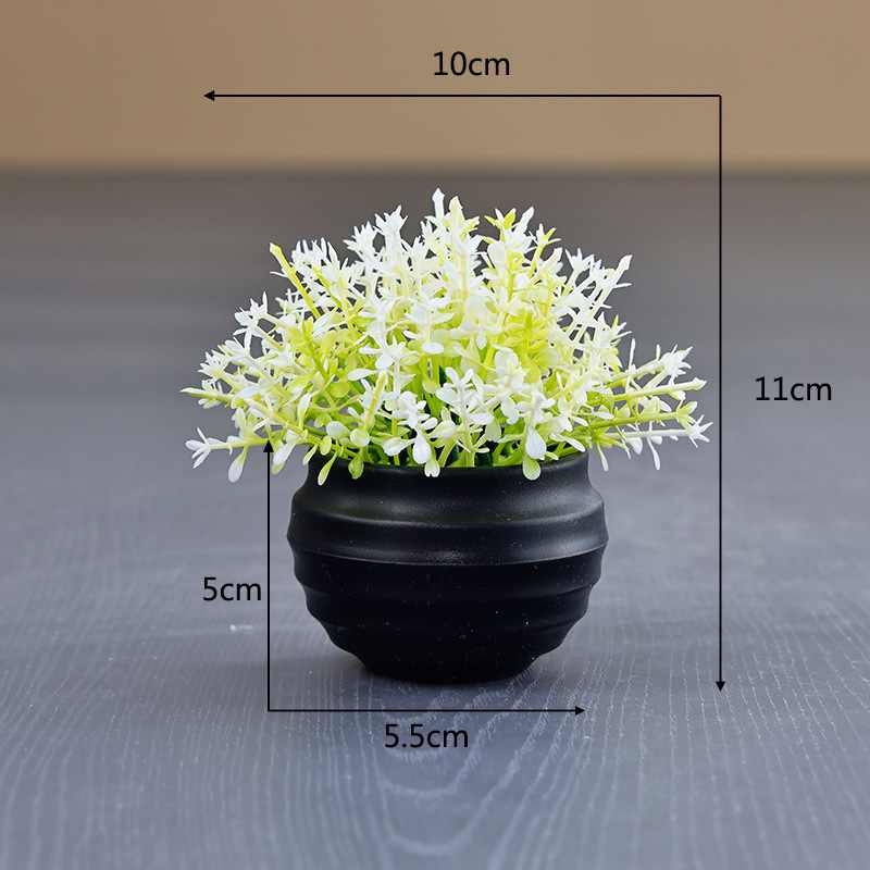 Artificial Eucalyptus plant in a black flower pot