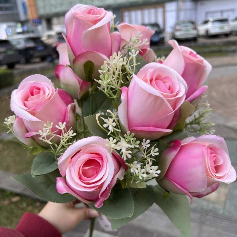 Artificial rosebud with nine blooms