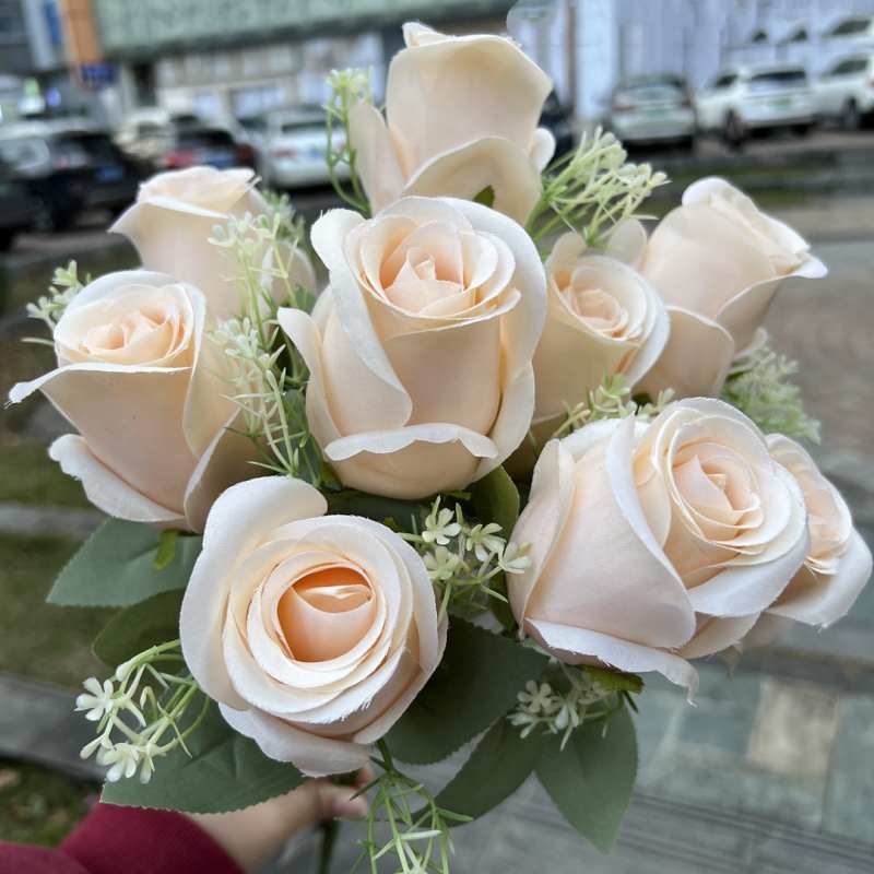 Artificial rosebud with nine blooms