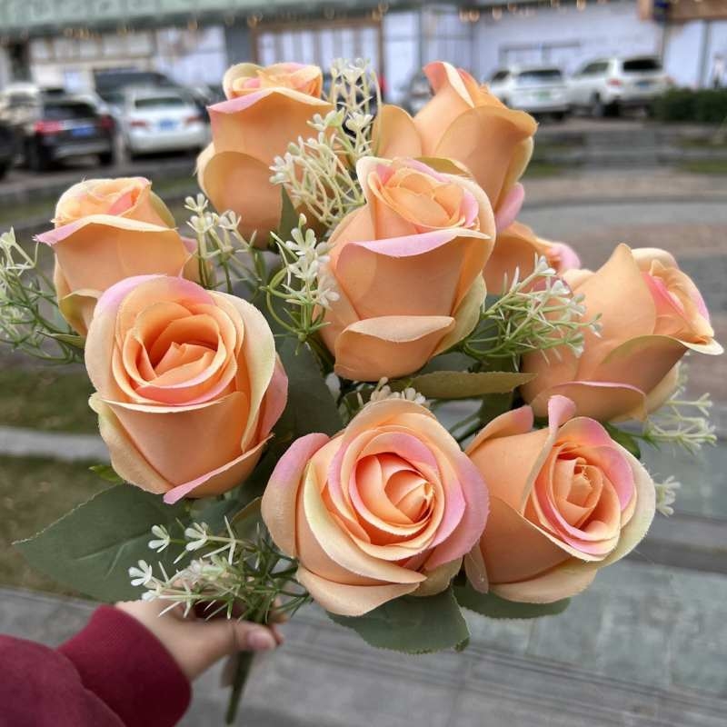 Artificial rosebud with nine blooms