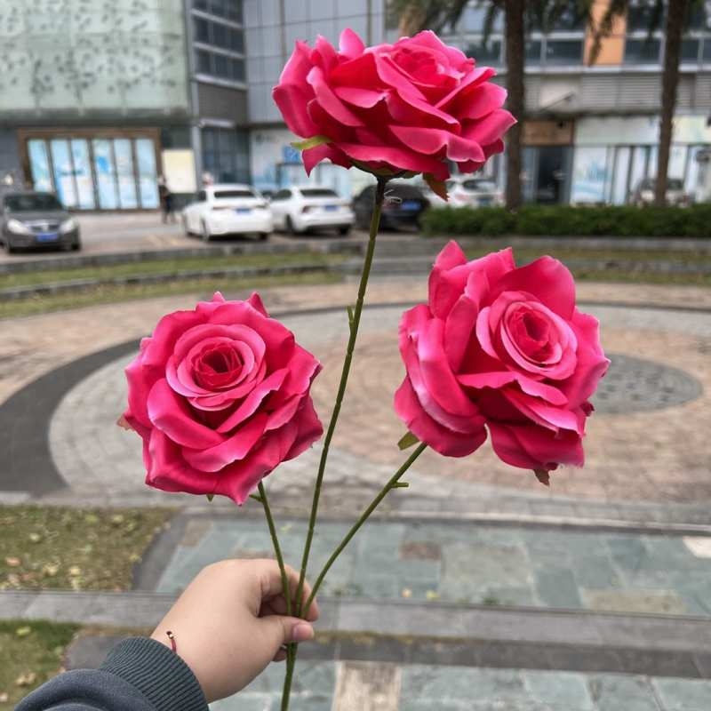 Artificial rose with three blooms