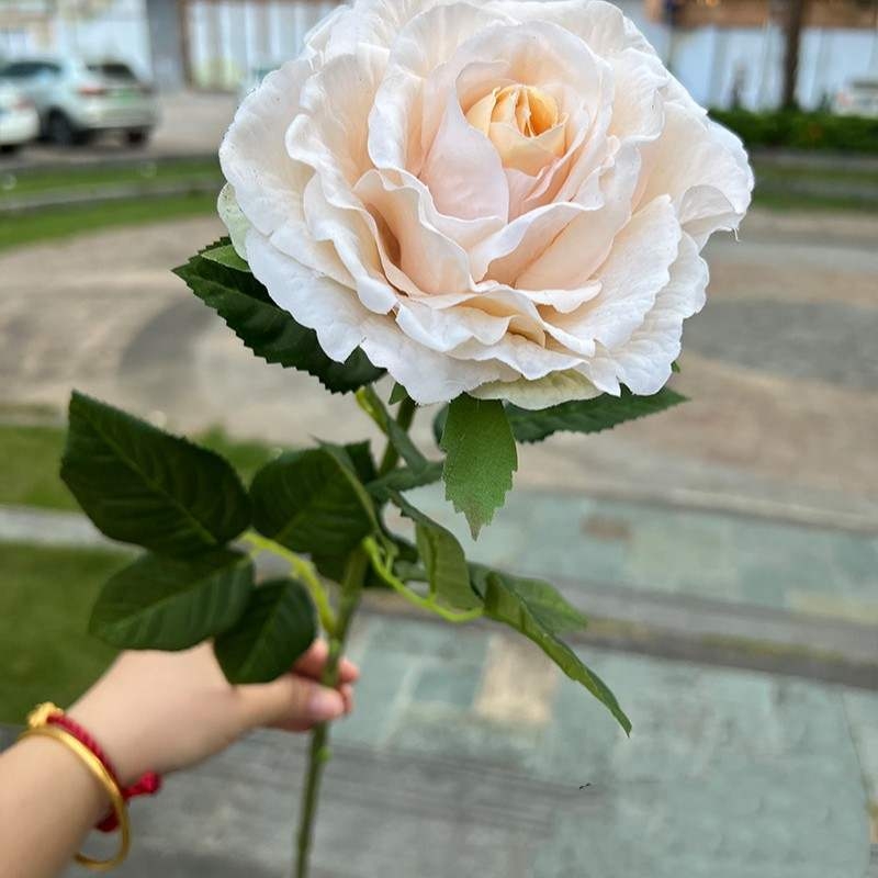 Soft-touch artificial single rose