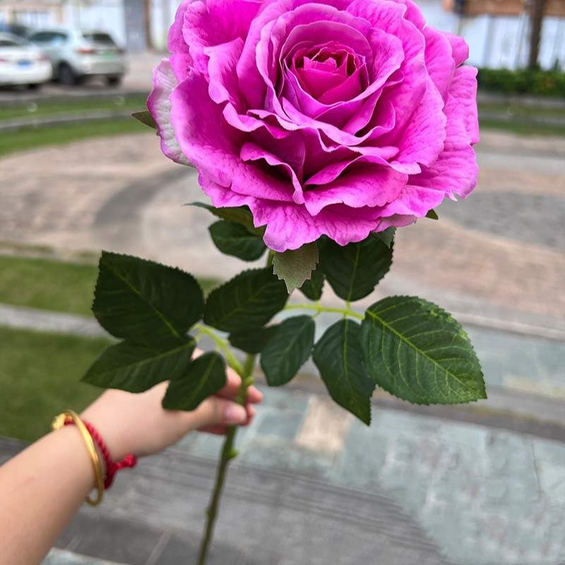 Soft-touch artificial single rose
