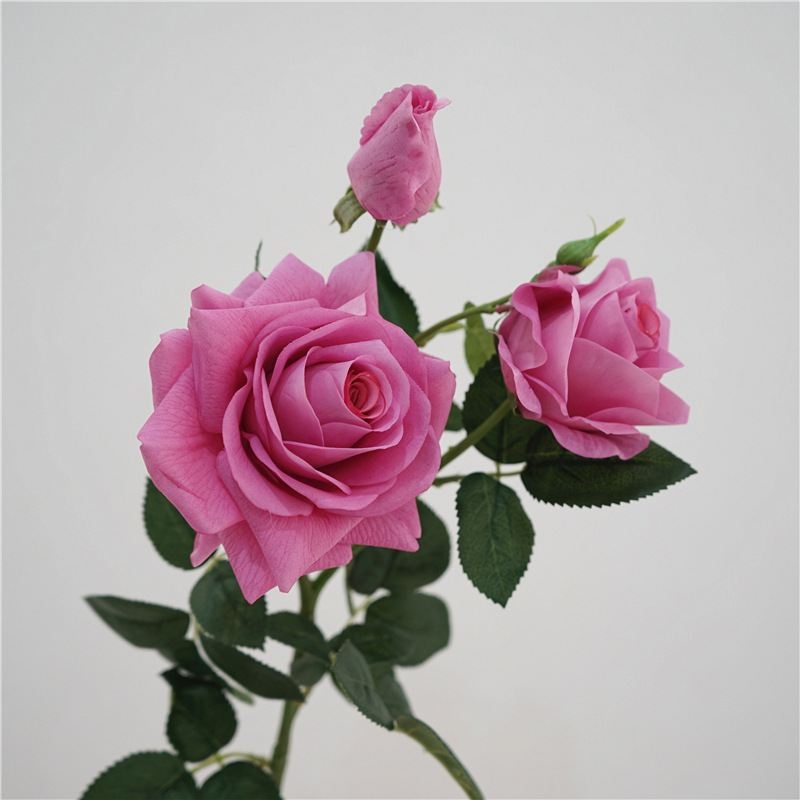 Soft-touch artificial rose with three blooms