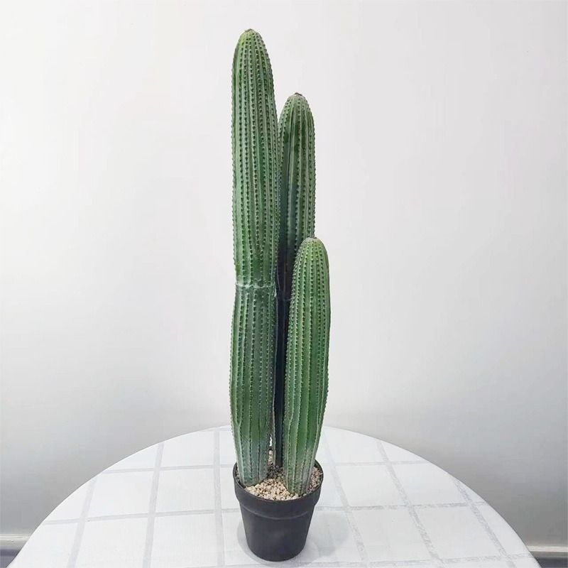 Artificial bonsai containing three cacti