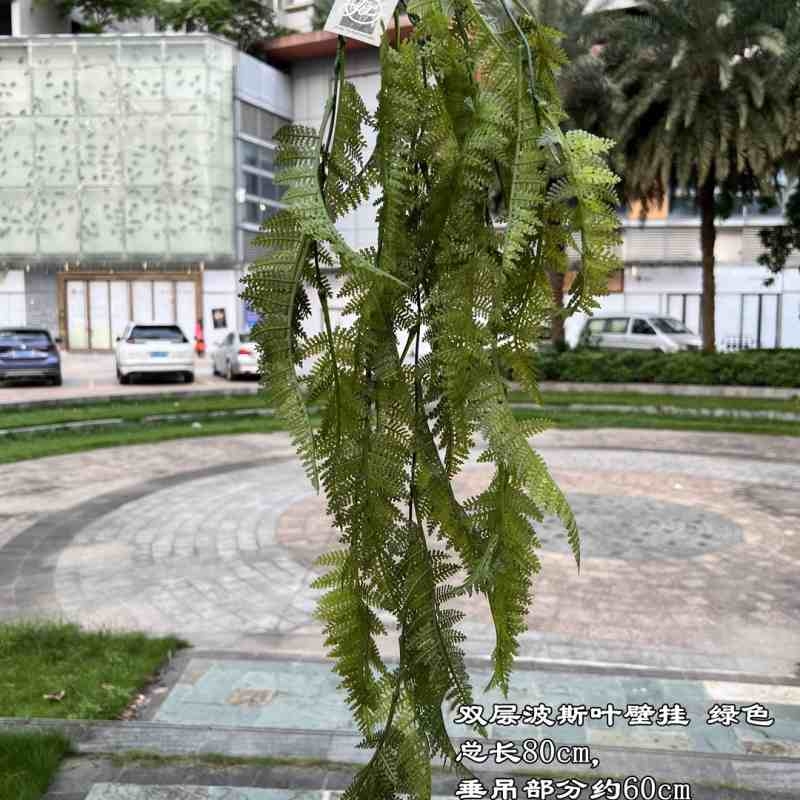 Artificial ferns hanging upside down